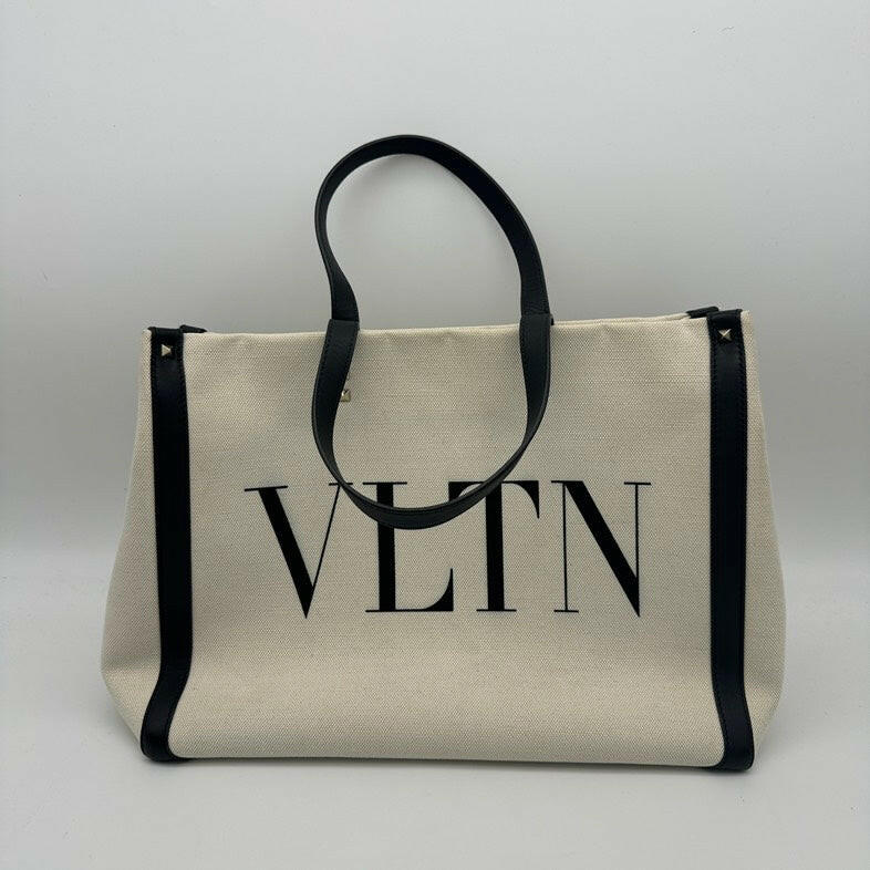 Valentino VLTN Beige Canvas Large Tote Bag with Black Straps.