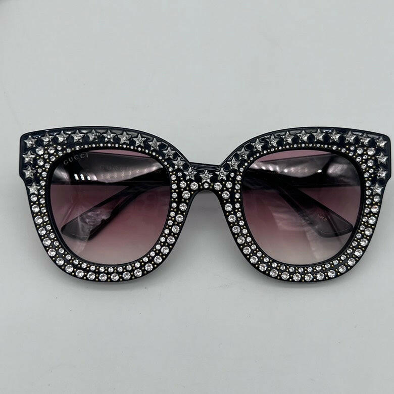 Gucci Black Studded Cat Eye Sunglasses with Gradient Lenses.