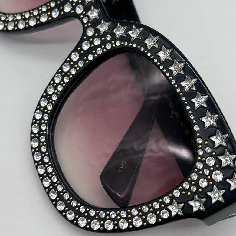 Gucci Black Studded Cat Eye Sunglasses with Gradient Lenses.