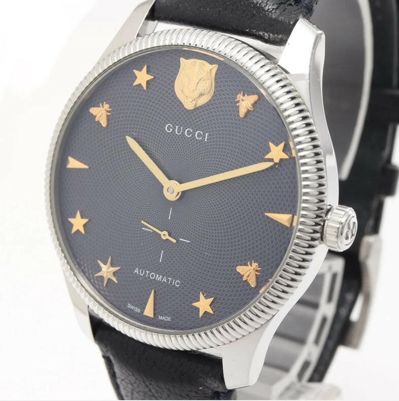 Gucci G-Timeless Automatic Watch 40mm Grey Dial Stainless Steel Case Black Leather Strap.