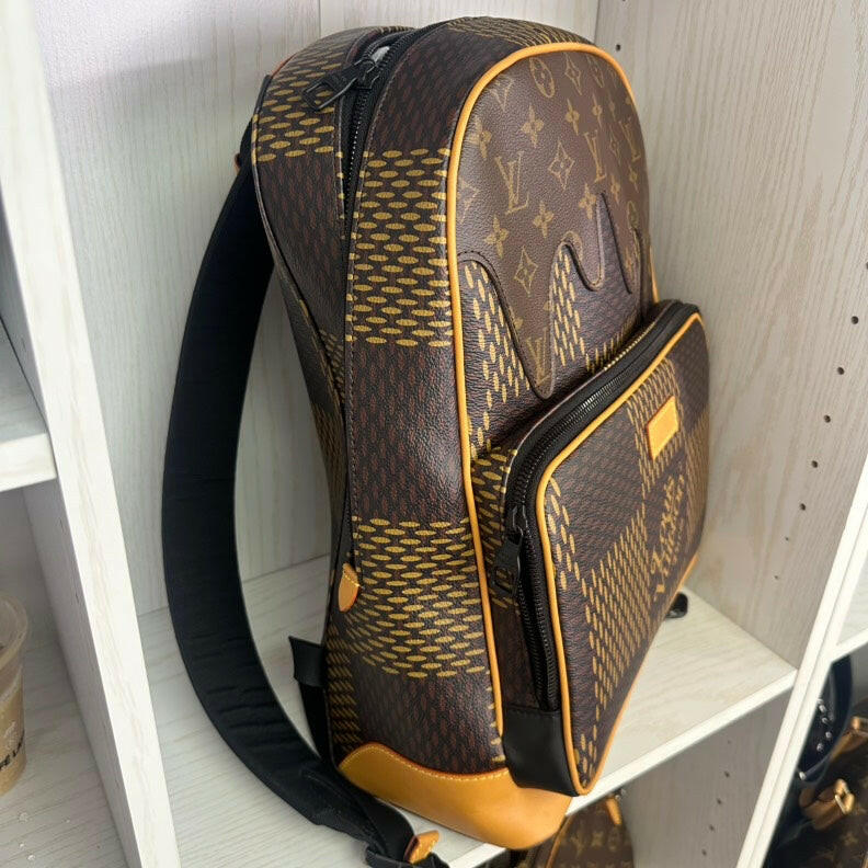 Louis Vuitton Brown Monogram Backpack Limited Edition Model with Front Pocket.