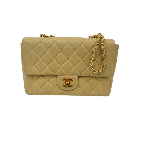 Chanel Vintage Beige Lambskin Single Flap Bag with Gold Hardware and Chain Strap - Medium Size.