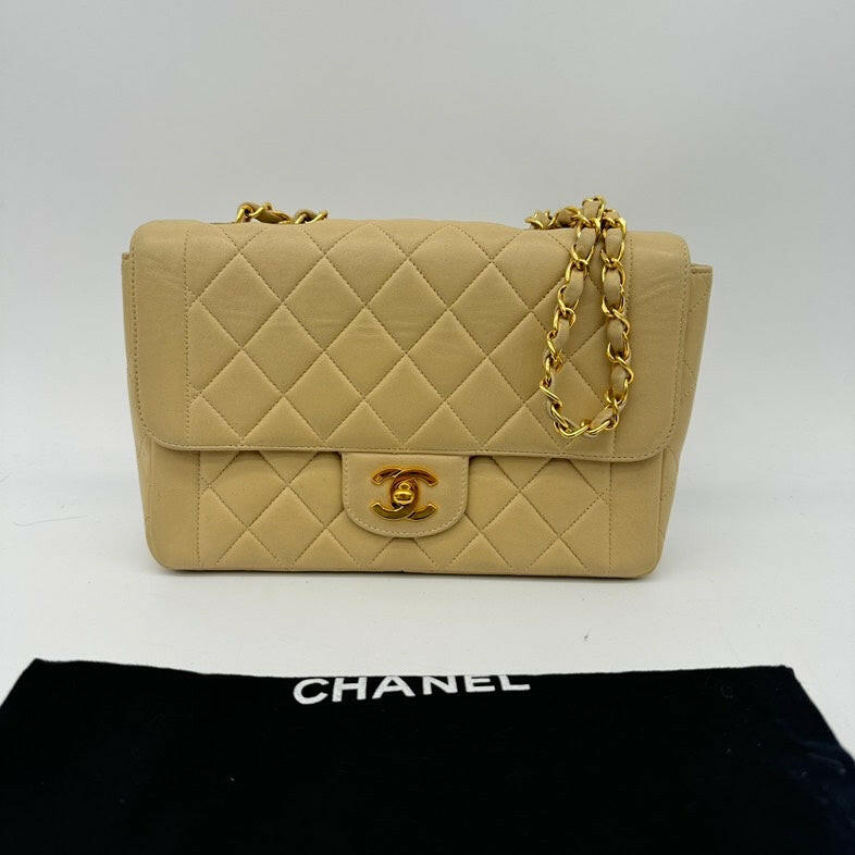 Chanel Vintage Beige Lambskin Single Flap Bag with Gold Hardware and Chain Strap - Medium Size.