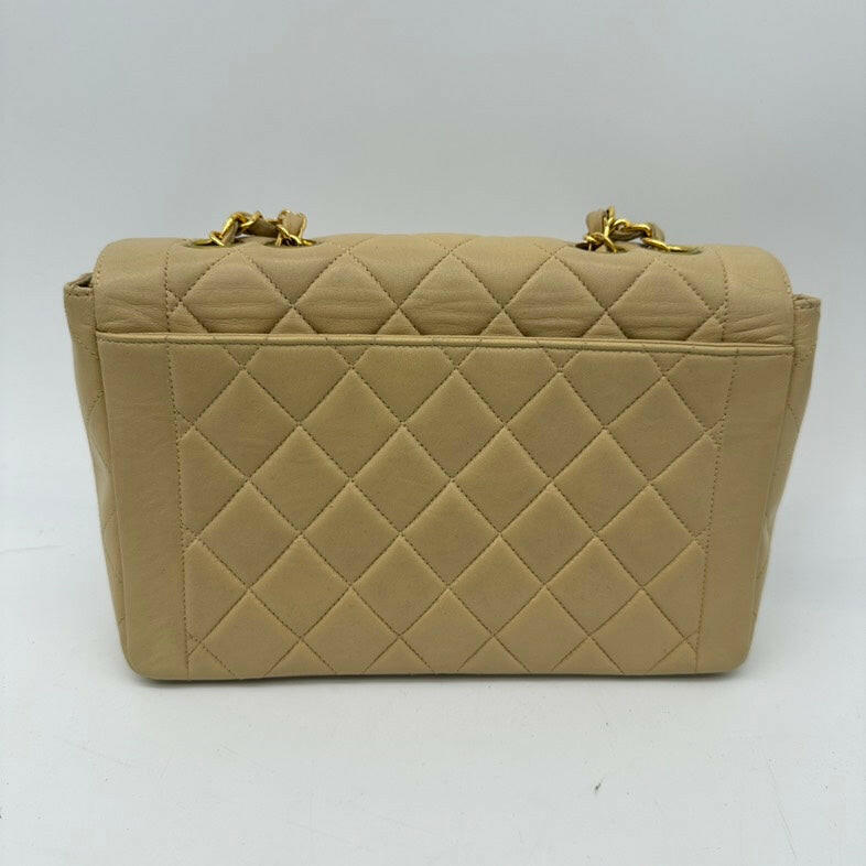 Chanel Vintage Beige Lambskin Single Flap Bag with Gold Hardware and Chain Strap - Medium Size.