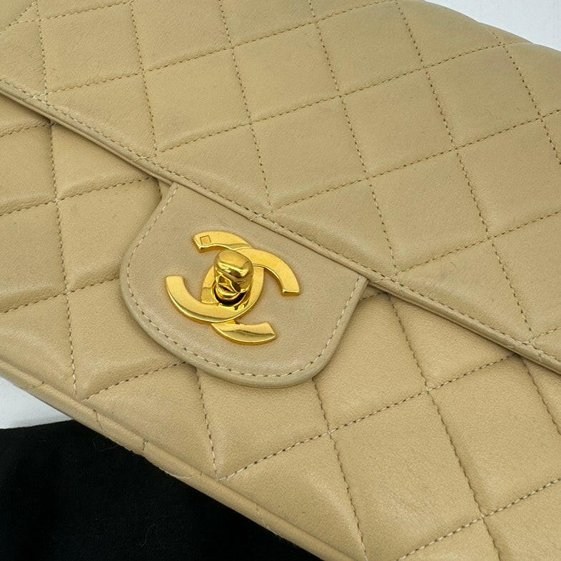 Chanel Vintage Beige Lambskin Single Flap Bag with Gold Hardware and Chain Strap - Medium Size.