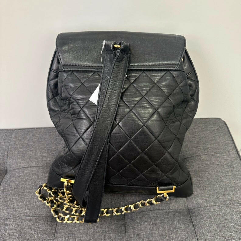 Chanel Vintage Black Lambskin Turn-lock Chain Backpack.