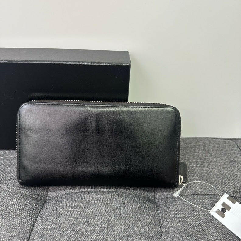 Chanel Black Leather Zippy Long Wallet.