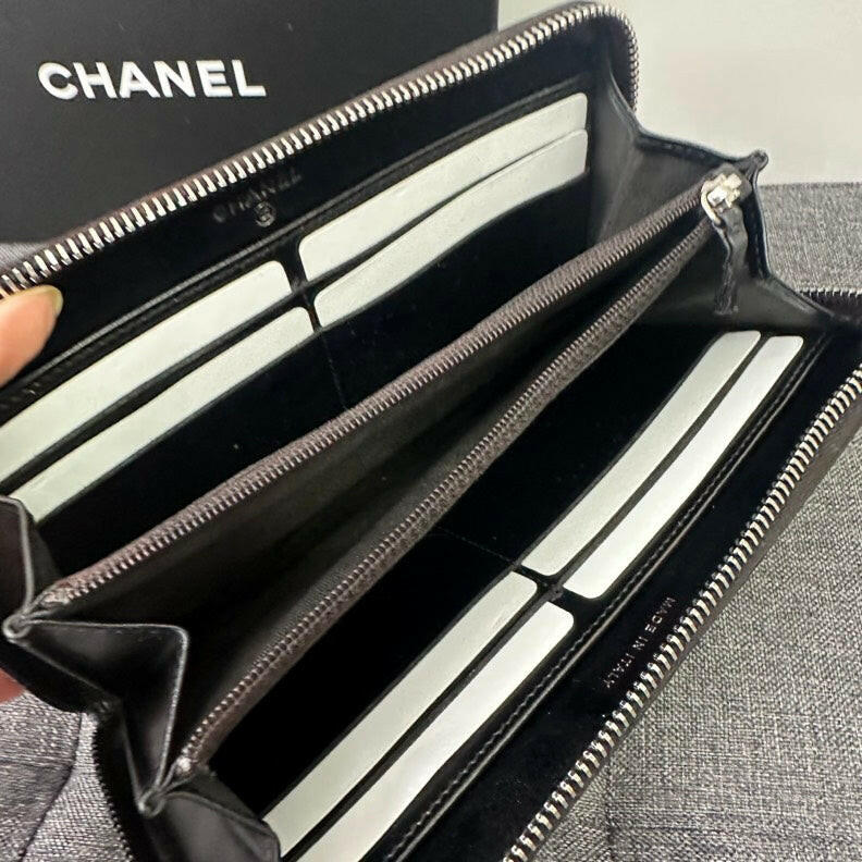 Chanel Black Leather Zippy Long Wallet.