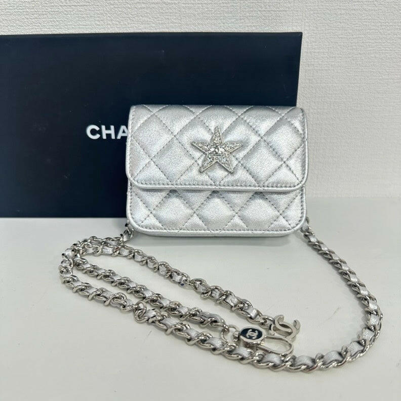 Chanel Lambskin Mini Star Chain Belt Bag in Silver.