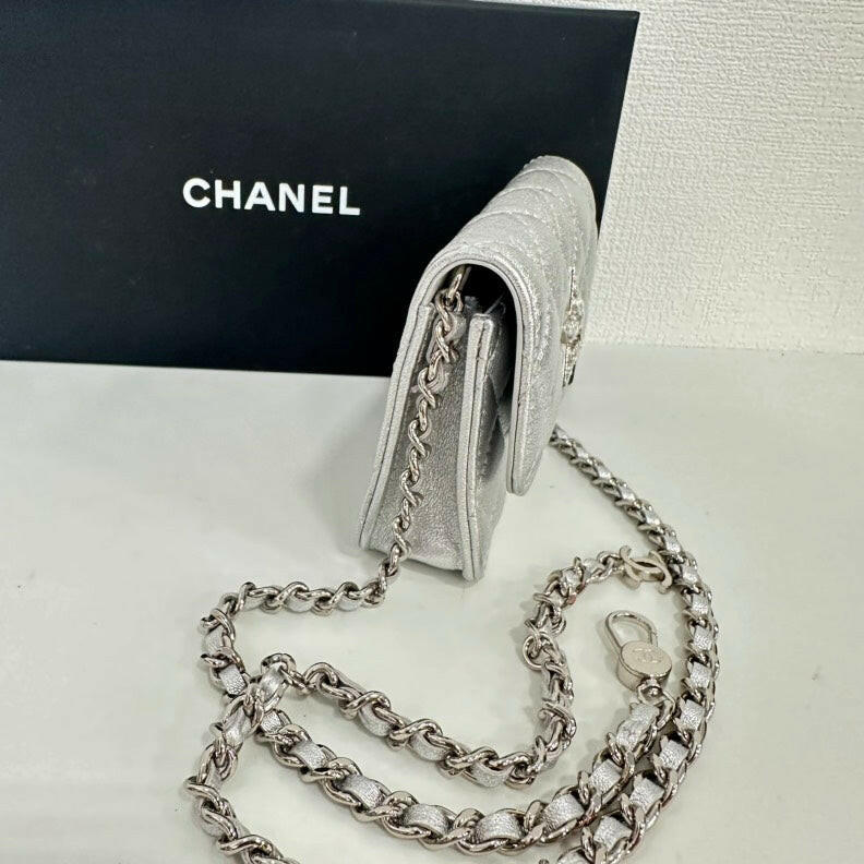 Chanel Lambskin Mini Star Chain Belt Bag in Silver.