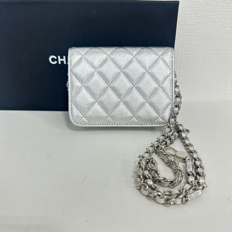 Chanel Lambskin Mini Star Chain Belt Bag in Silver.