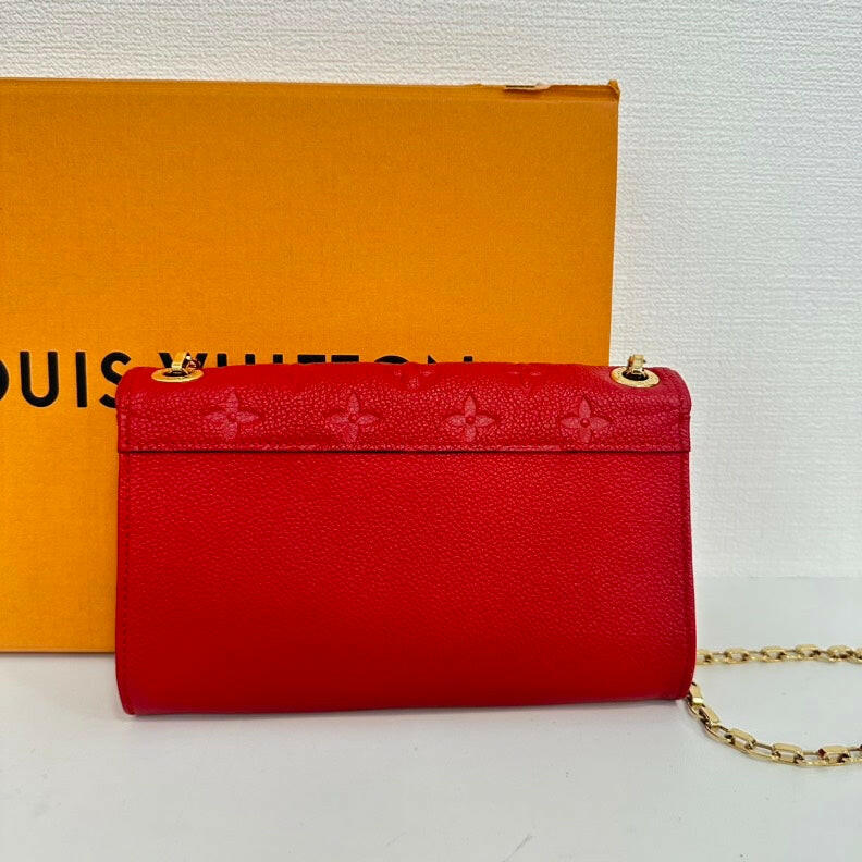 Louis Vuitton Monogram Empreinte Wallet on Chain - Red, Compact Size.