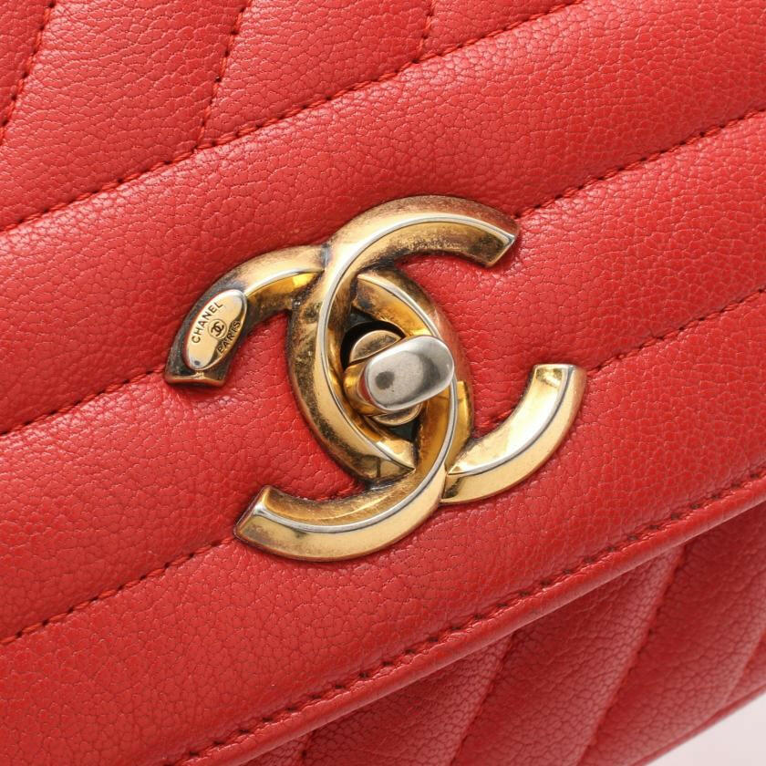 Chanel Chevron Bias Stitch Chain Shoulder Bag Leather Orange Red with Antique Gold Hardware.