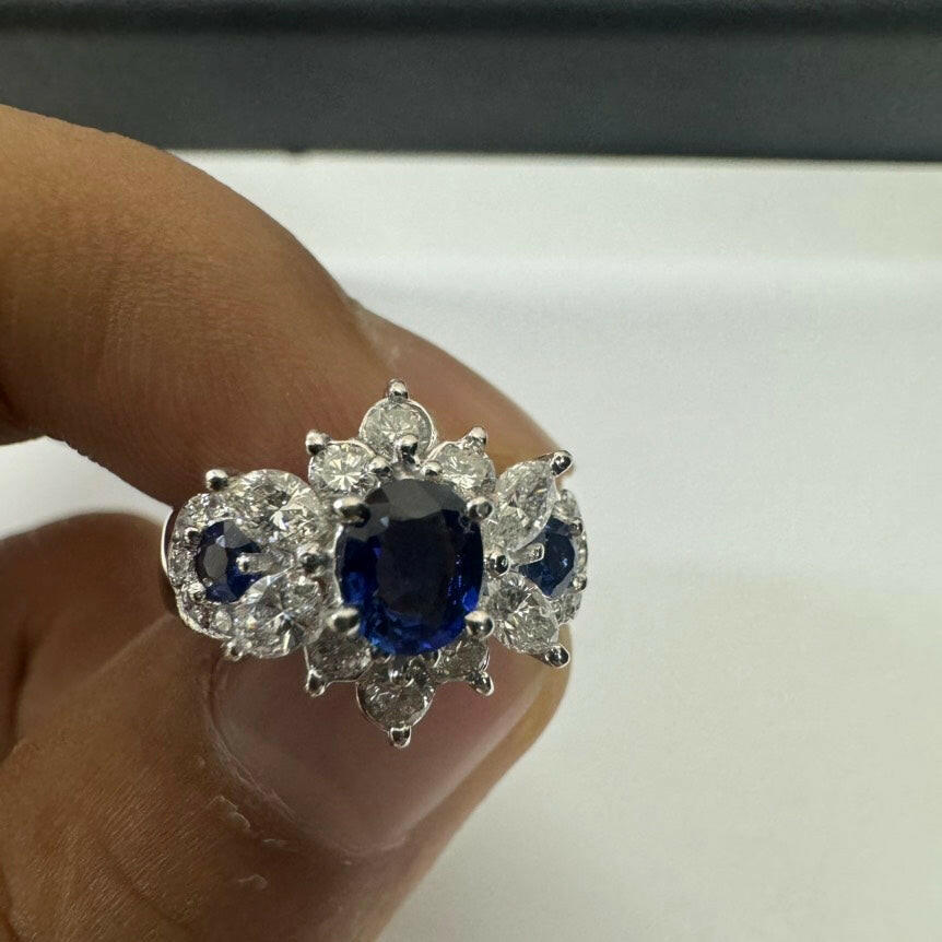 Pt900 Sapphire and Diamond Cluster Ring - Blue Oval 0.70/0.25ct, 0.85ct Total, Size 7.4g.