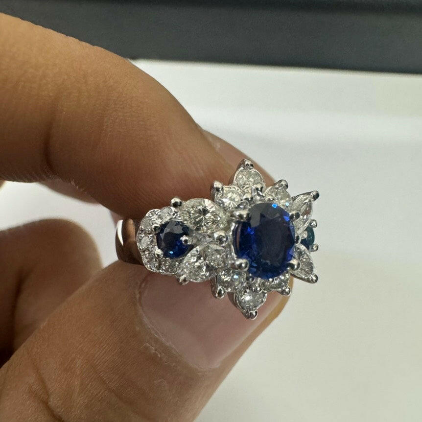 Pt900 Sapphire and Diamond Cluster Ring - Blue Oval 0.70/0.25ct, 0.85ct Total, Size 7.4g.