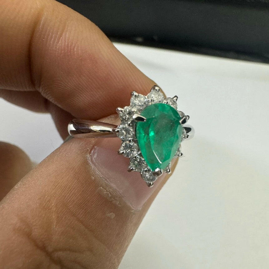 Platinum Ring with 1.14ct Pear-Shaped Emerald and 0.44ct Round Diamonds, 5.6 Grams - Green Gemstone Halo Setting.