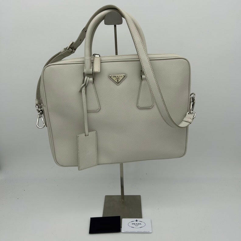 Prada White Leather Shoulder Bag with Top Handles and Adjustable Strap.