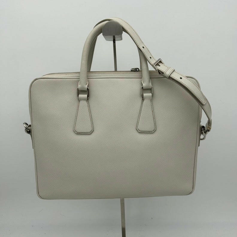 Prada White Leather Shoulder Bag with Top Handles and Adjustable Strap.