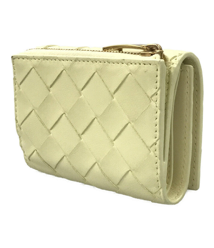 Bottega Veneta Light Yellow Leather Clutch & Wristlet.