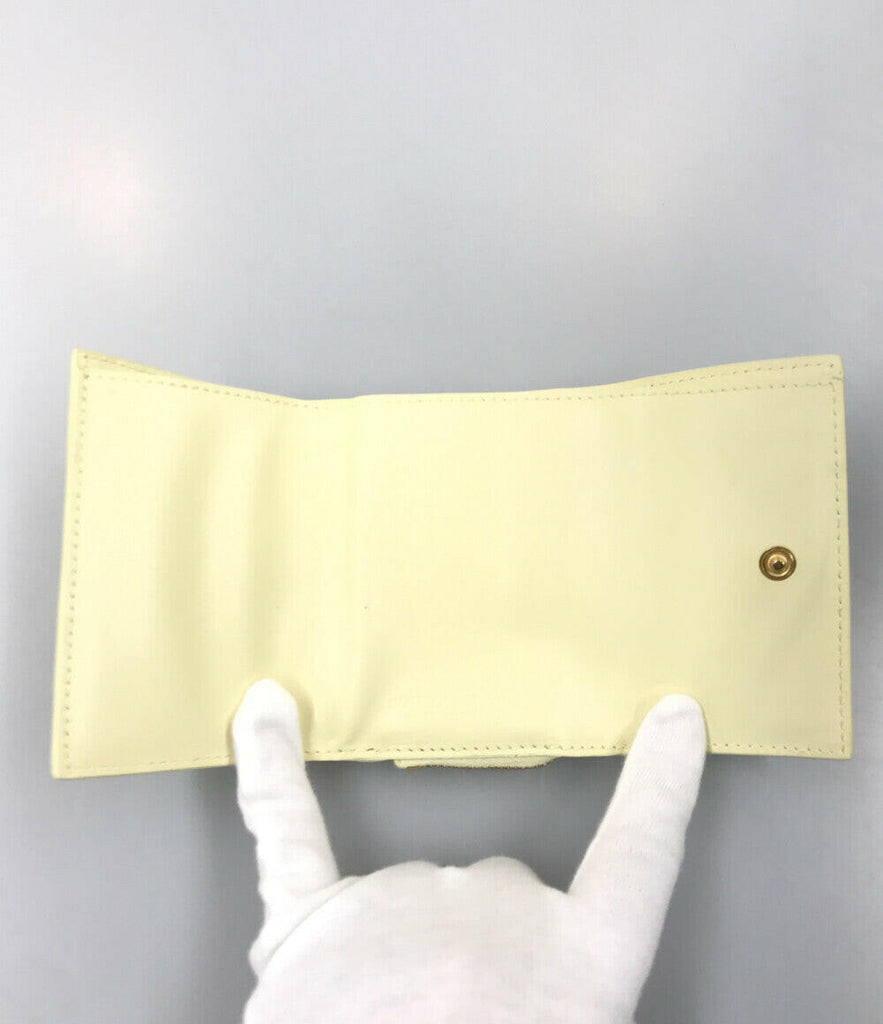 Bottega Veneta Light Yellow Leather Clutch & Wristlet.