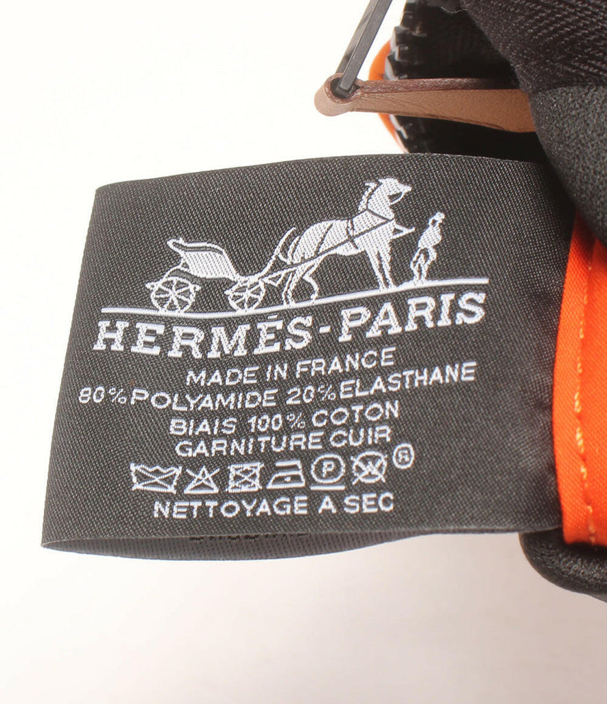 Hermès Bain Mini Pouch Orange Neoprene Clutch.