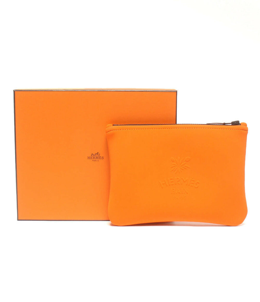 Hermès Bain Mini Pouch Orange Neoprene Clutch.