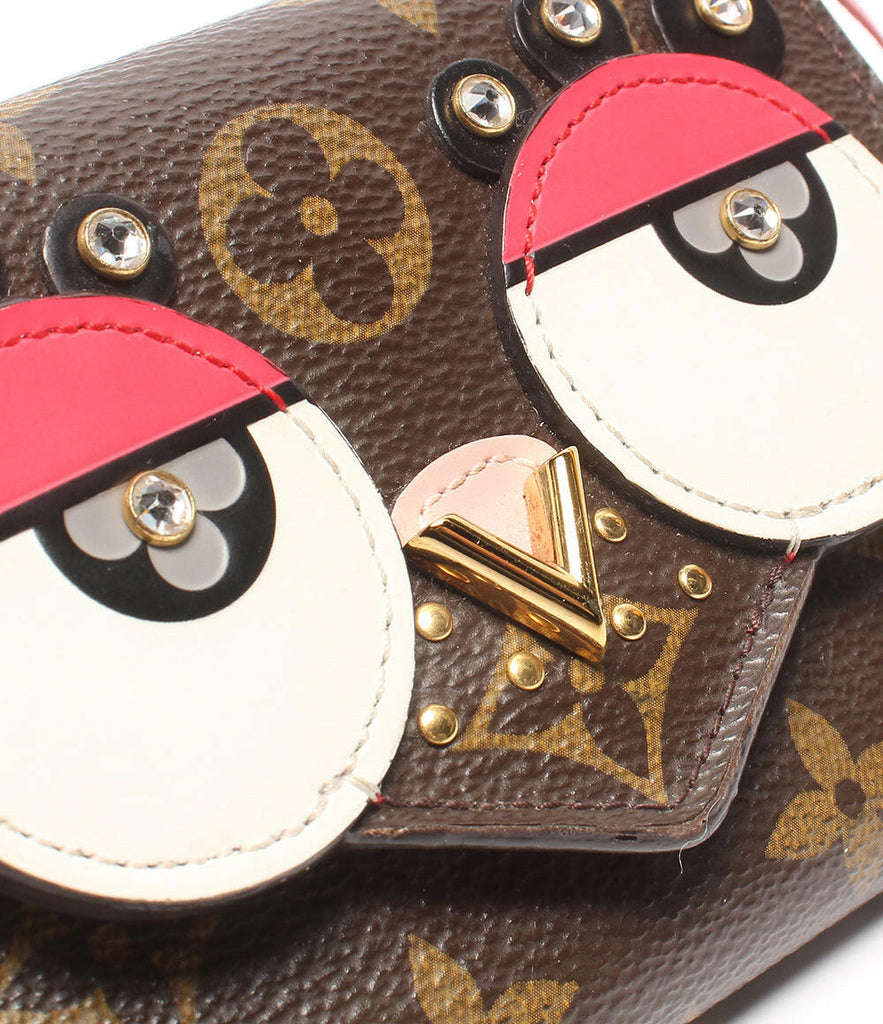 Louis Vuitton Monogram PVC Clutch & Wristlet with Cartoon Eyes Design - Brown, Small.