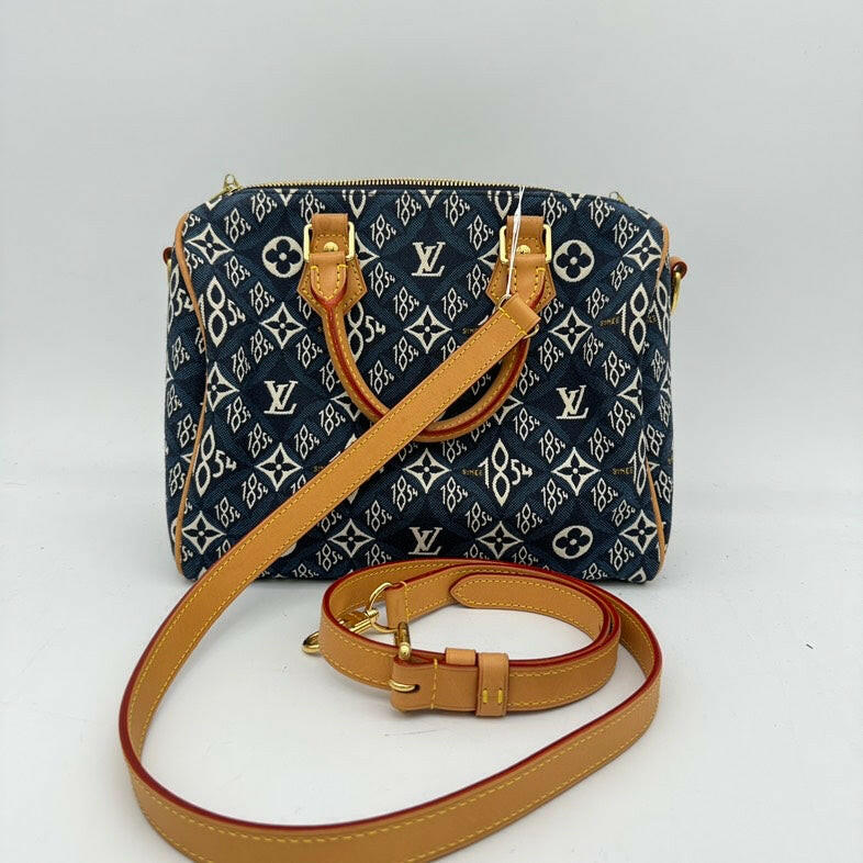 Louis Vuitton Monogram Canvas Blue and Tan 2-Way Shoulder Bag with Leather Trim.