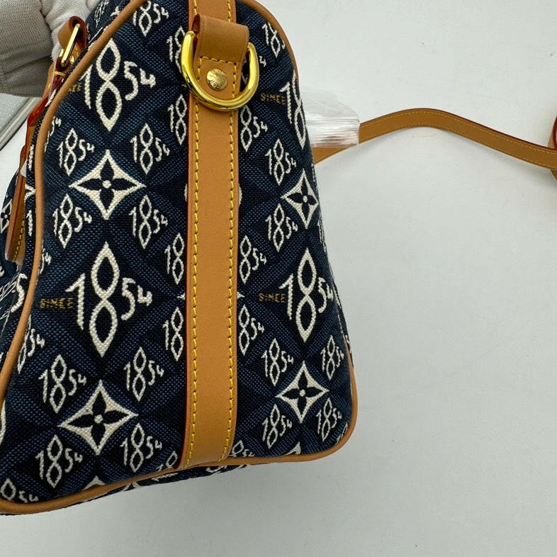 Louis Vuitton Monogram Canvas Blue and Tan 2-Way Shoulder Bag with Leather Trim.