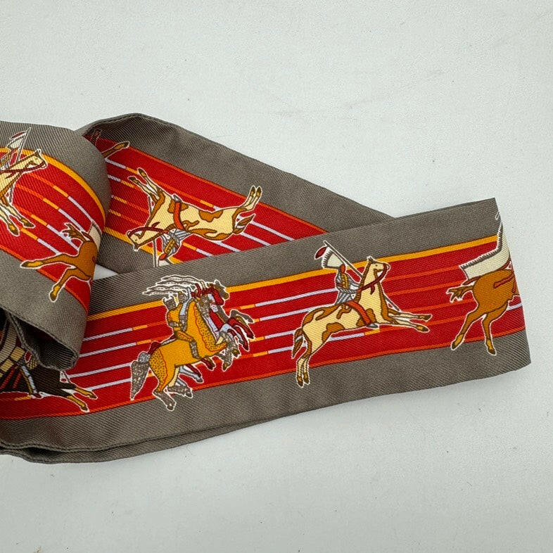 Hermès Silk Twilly in Red and Grey with Reindeer Design, 34 x 8 cm.