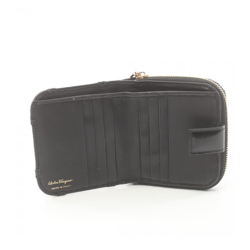 Salvatore Ferragamo Black Leather Bi-fold Wallet Compact.